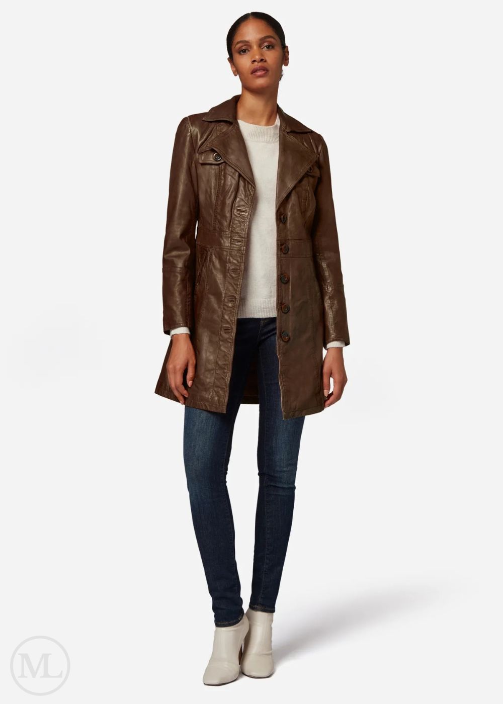 Woman wearing a dark brown leather coat on a white background