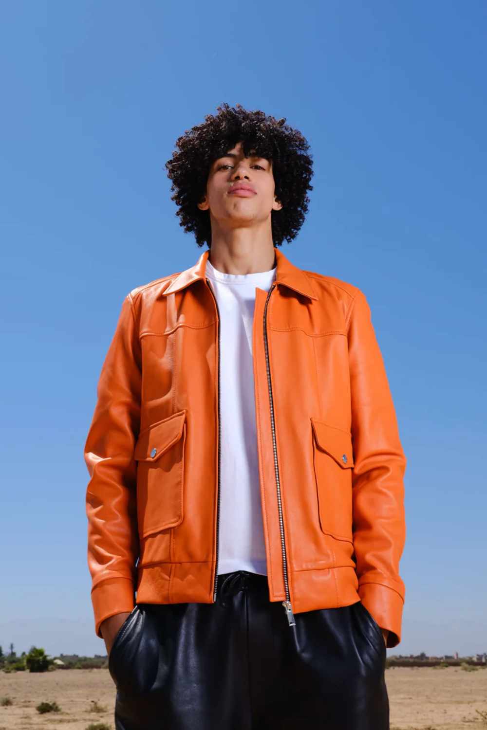 files/Axel_Men_sLeatherTruckerJacketwithFlapPockets-Orange-frontphotowithmodel.jpg
